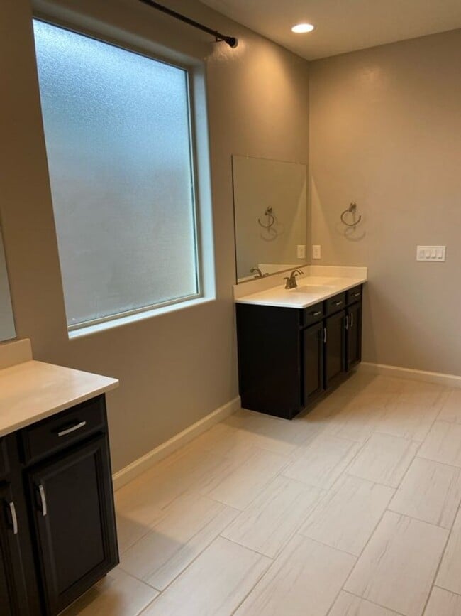 Building Photo - STUNNING NEWER HOME- GATED
