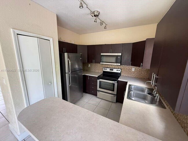 Building Photo - 6990 NW 177th St