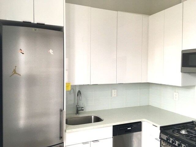 Building Photo - 58-25 Myrtle Ave