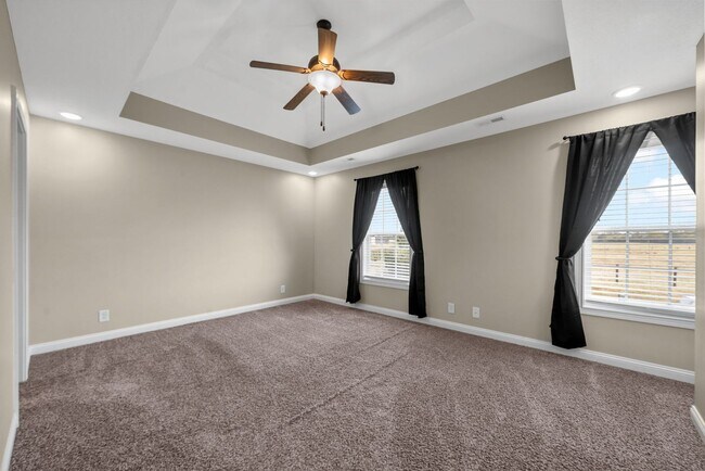 Building Photo - Spacious 4-Bedroom Home with Modern Upgrad...