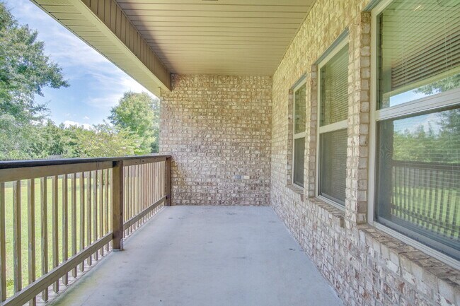 Building Photo - Spacious 4BR Pool Home with Modern Upgrade...