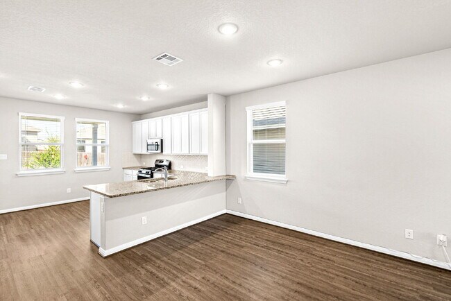 Building Photo - A Bright and Spacious Home Designed for Co...