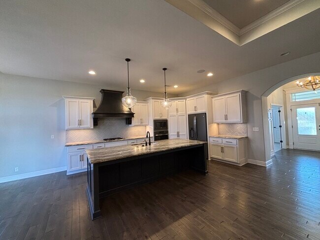 Building Photo - Modern Olathe Beauty with Covered Lanai, Loft & Main-Level Primary Suite