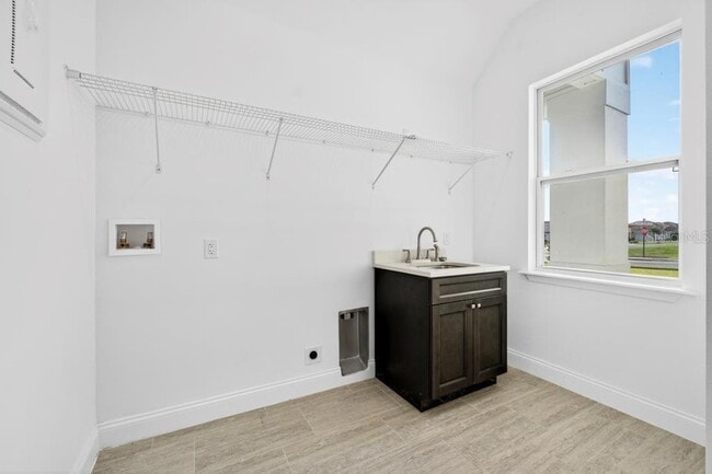 Building Photo - 200 Snowy Orchid Way