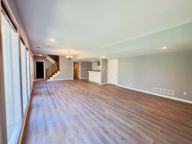 Building Photo - {6411} Enchanted Lake Estates + Updated Kitchen, Fresh Paint Throughout +  Main Floor Primary Bed...