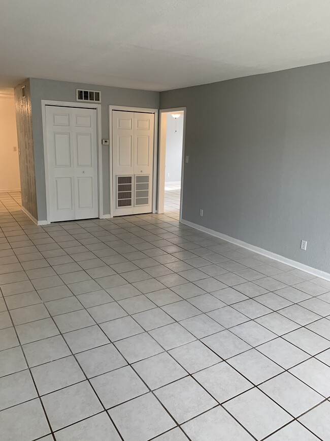 living room looking towards kitchen - 3877 Herschel St