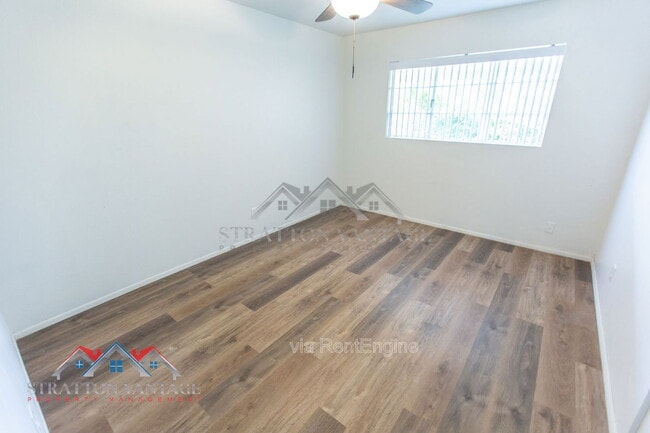 Building Photo - 8119 E Amelia Ave