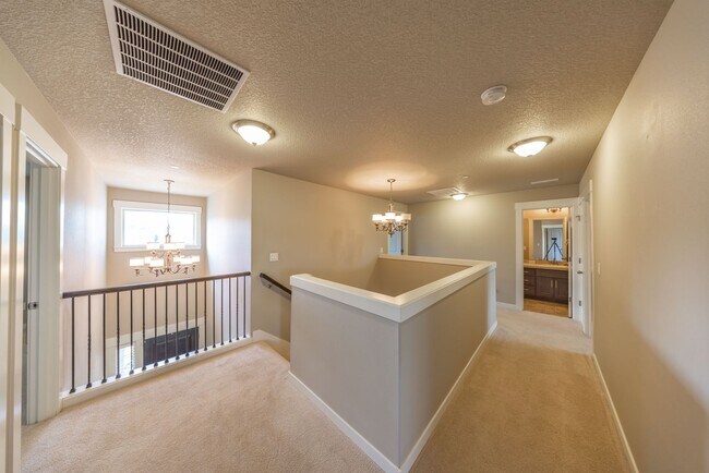 Building Photo - Four Bedroom Home + Bonus & Den in Gated C...