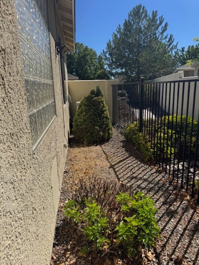 Building Photo - Located in a Quiet, Gated Community in Car...