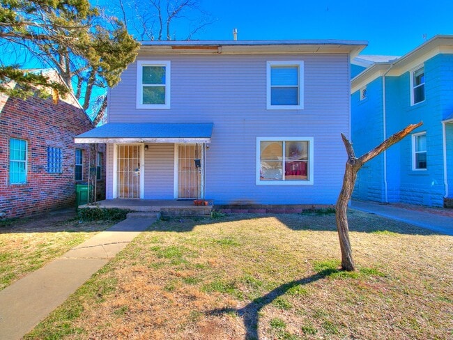Building Photo - Cute Duplex - Upper Unit!