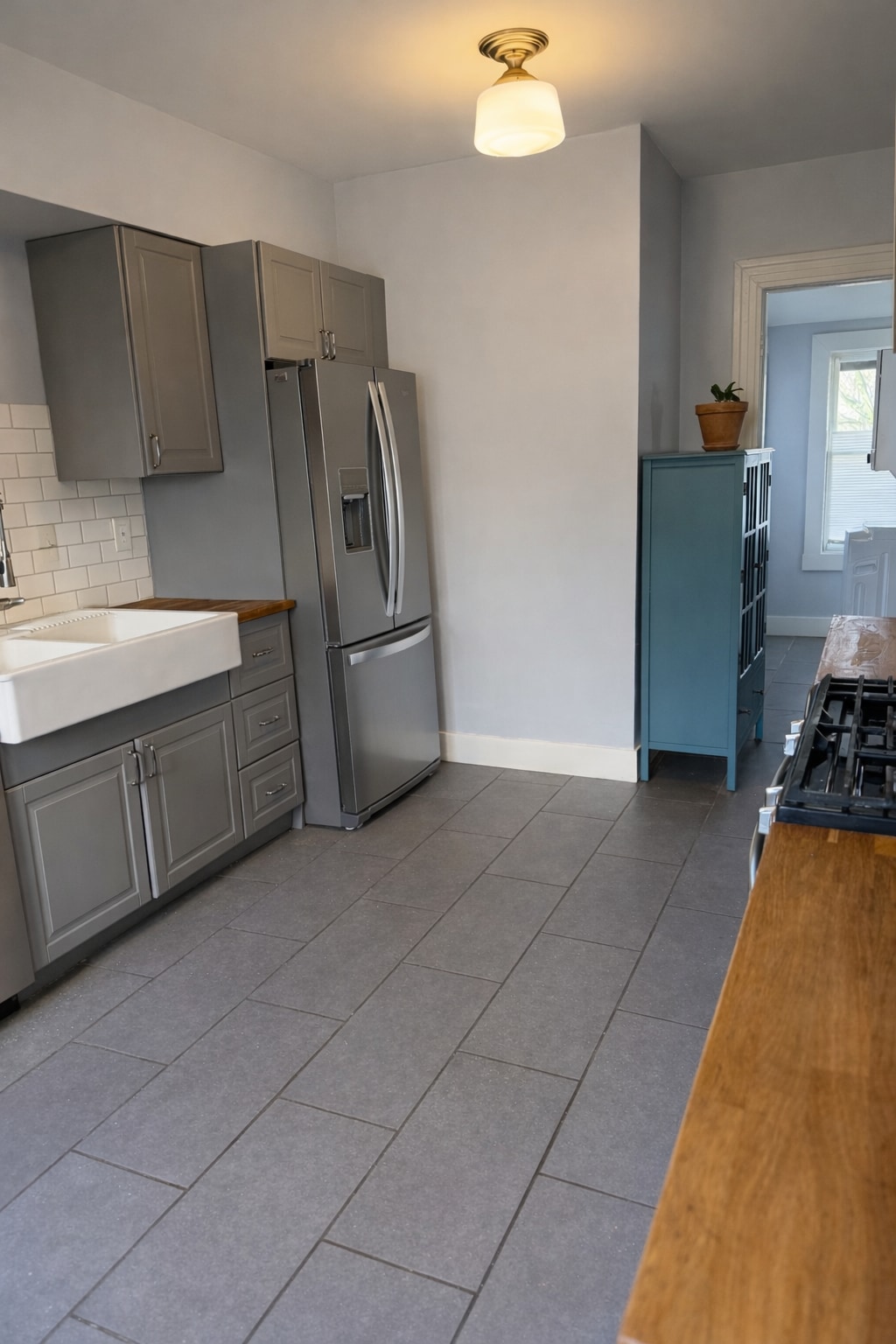 Open flow from kitchen to dining — perfect for hosting or just keeping the chef company. - 604 NE Shaver St