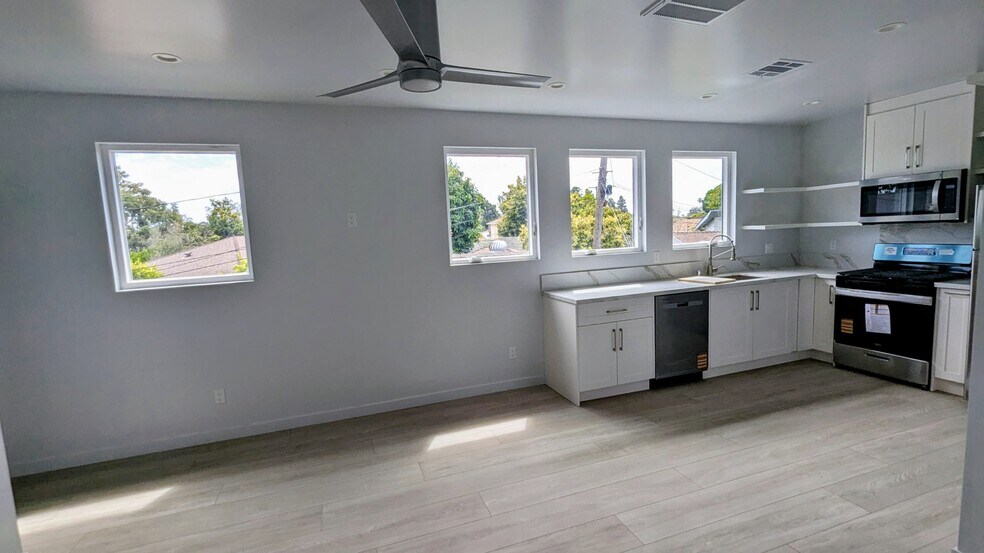 Open Floor Plan with West Facing Windows with Evening Sunsets and Breezes - 3355 Virginia Ave