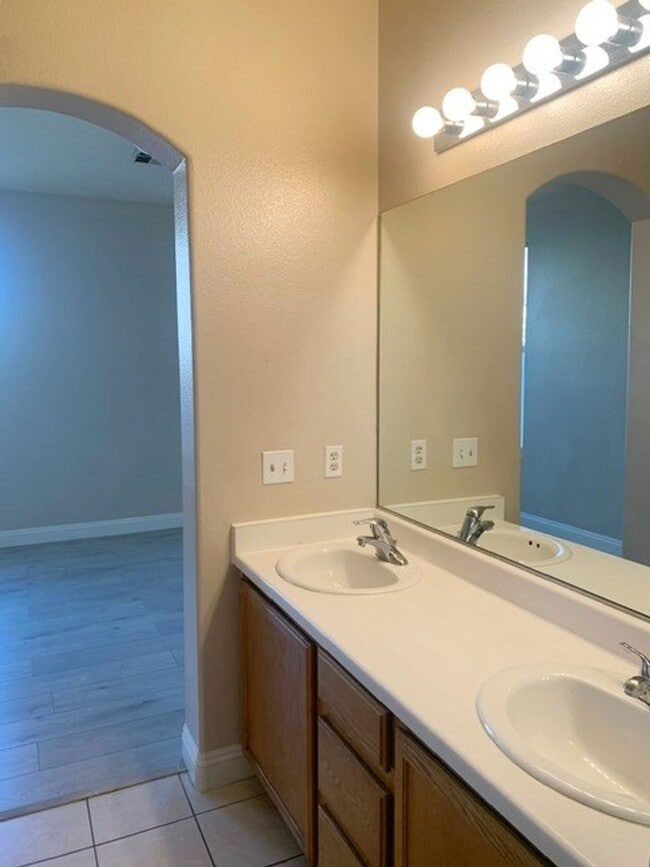 Building Photo - Single story 3 bed 2 baths property inside the gated Cactus Springs community! Home has all LVP a...