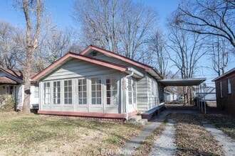 Building Photo - "Charming 2-Bed Home with Gleaming Hardwoo...