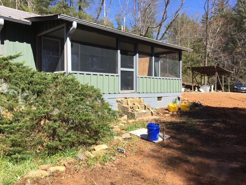 Screen porch from outside, before landscaping - 3837 Old Hendersonville Highway