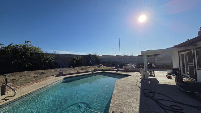 Building Photo - Beautifully remodeled pool home situated on a spacious quarter-acre lot
