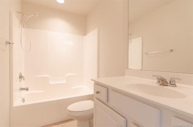 Building Photo - "Charming 3-Bed Oasis with Granite Accents & Pool Retreat in Belmont!"