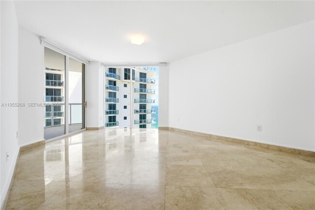 Building Photo - 18671 Collins Ave