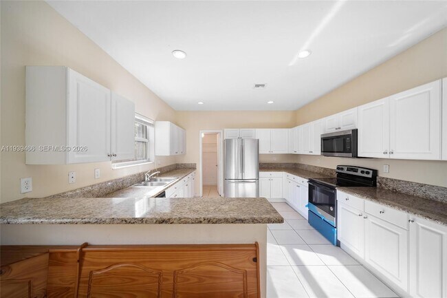 Building Photo - 3641 NE 4th St