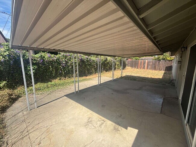 Building Photo - 4 Bedroom 2 Bath Home Freshly Painted With New Landscaping Underway