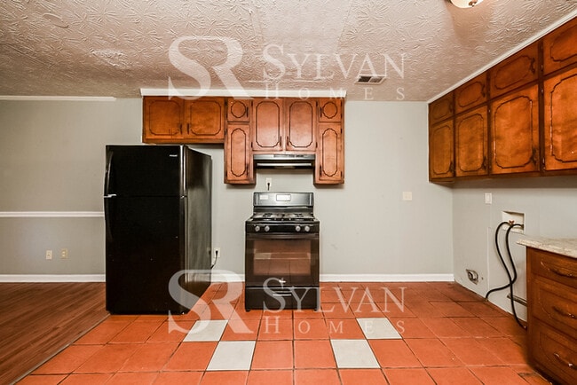 Building Photo - The living is easy in this 3 bedroom, 2 bathroom home