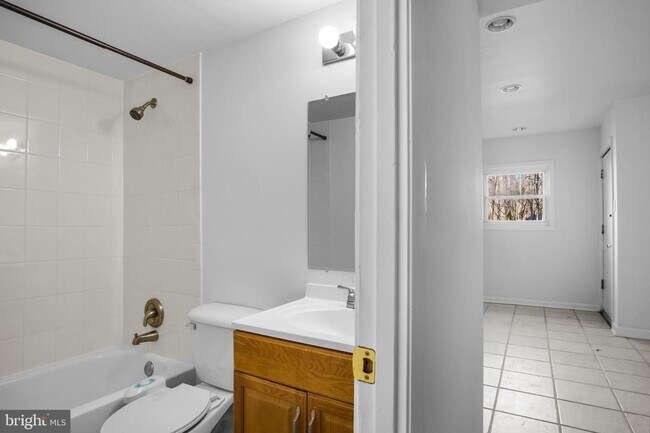 Building Photo - Headline:  Spacious & Updated Townhouse in Prime Reston Location