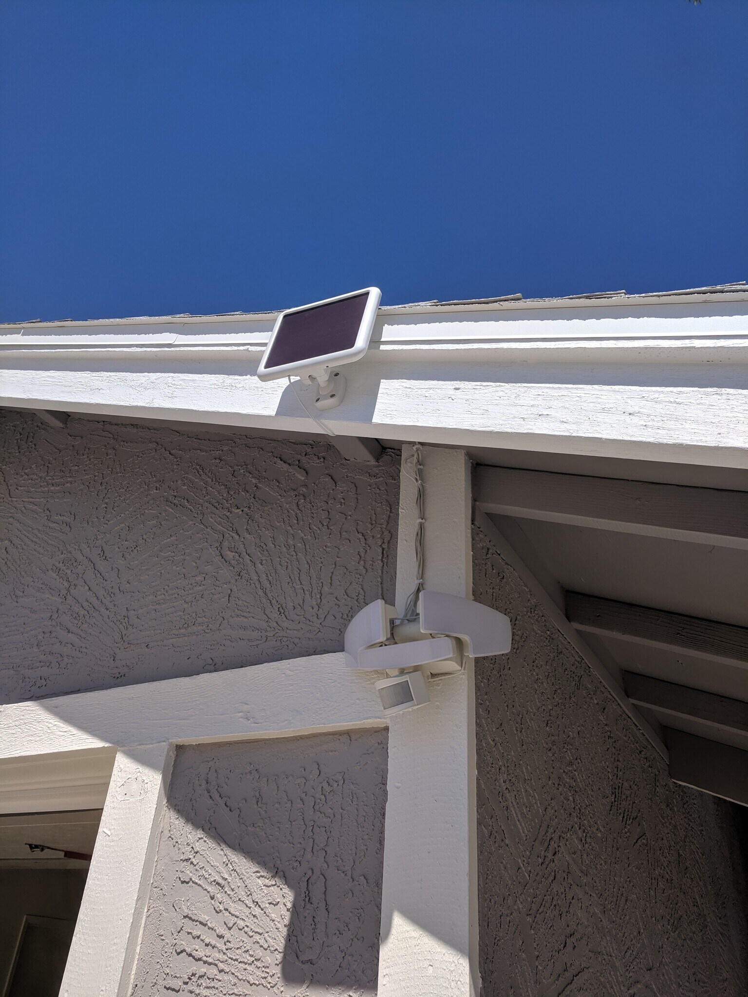 Solar security motion sensor light at front of house - 14101 N 78th Dr