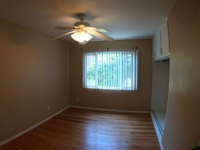 Building Photo - BEAUTIFUL WOOD FLOORS IN THIS 5 BED 2 BATHROOM HOUSE- LARGE DOGS OK