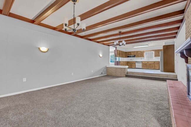 Building Photo - spacious 4-bedroom, 2.5-bath home featuring a 2-car garage and fresh updates throughout.