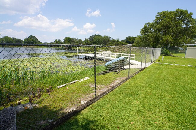 Fenced Back Yard with Lake View - 709 Meredith St
