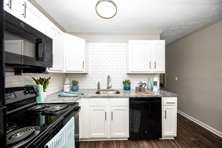 Backsplash + Granite Counters - Ashton on Main