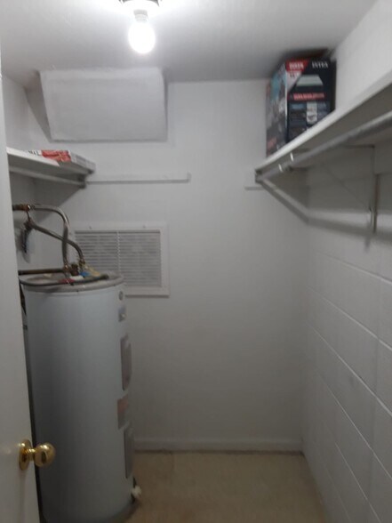Storage closet w/water heater - 405 Adams Ave