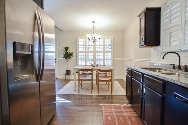 Building Photo - Pet Friendly Three Bedroom with Bonus!