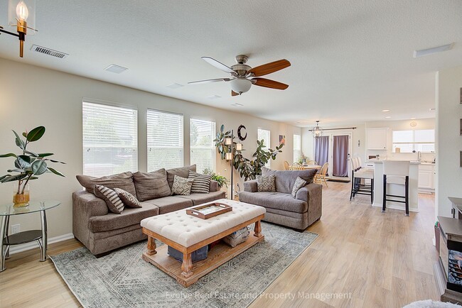 Building Photo - Evolve Real Estate: Beautiful Corner Townhome Available for Move-in on July 21st!