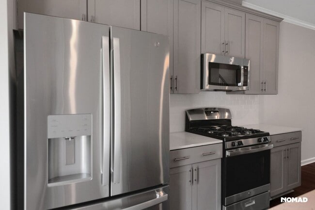 Building Photo - Brand New Charming 2 master BR Townhome in...