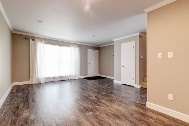 Building Photo - Spacious 4-Bedroom Home with Private Backyard and Solar Savings – Prime Location!