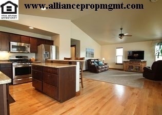 Building Photo - Centrally-located 3 bedroom home with paved RV parking.