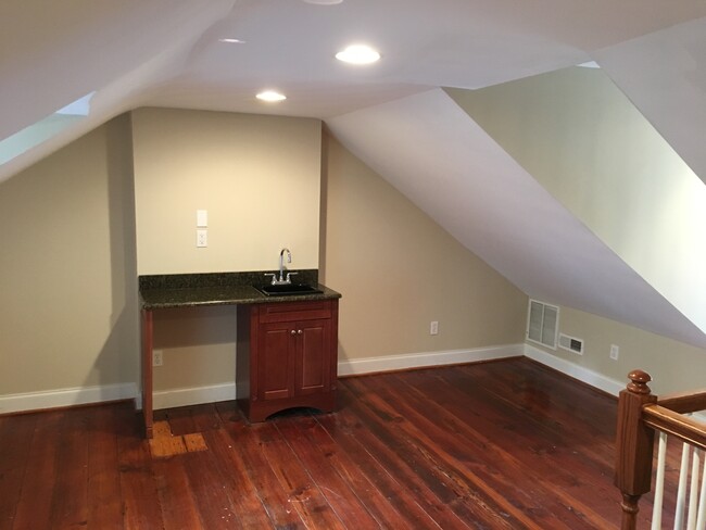 View of wet bar in loft - 8198 Main St