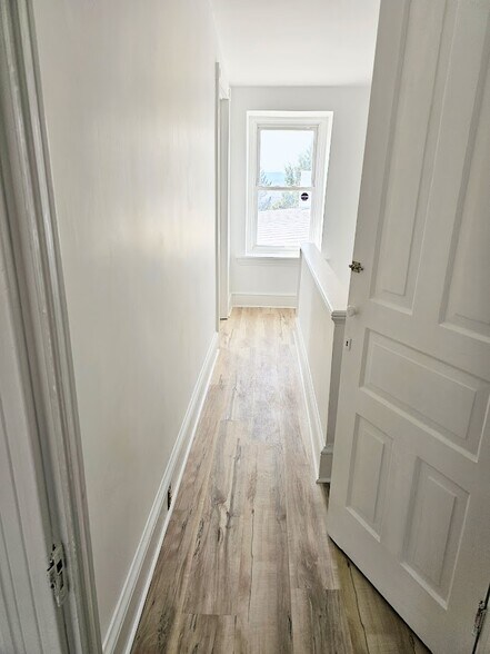 Top floor hallway - 148 Clymer St