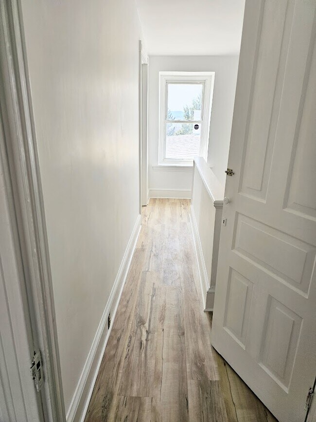 Top floor hallway - 148 Clymer St