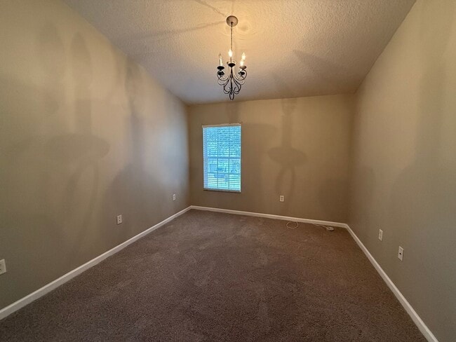 Building Photo - Beautiful home located inside gated commun...