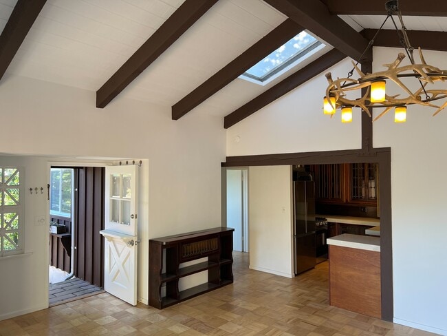 Kitchen and bedroom hallway from living room - 2021 Rosilla Pl