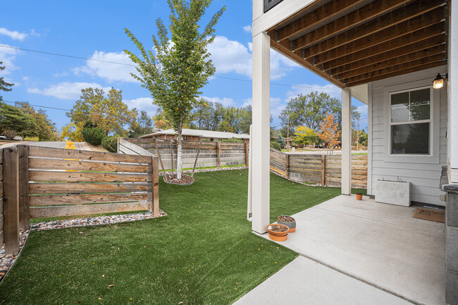 Private Fenced Yard with AstroTurf & Covered Front Porch - 2856 Kendall St