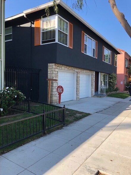 The living room sits atop the two garages. - 1334 E 1st St