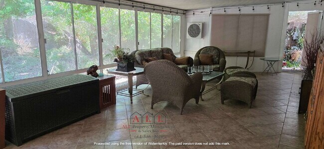 Building Photo - 3 Bed | 2 Bath Home with Office, Sunroom, Outdoor Kitchen & Backyard Oasis