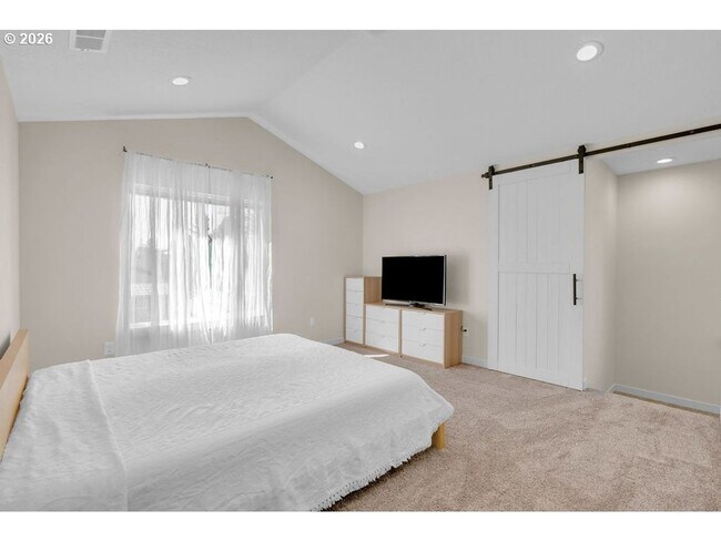 Building Photo - Bright Open-Concept Home with Vaulted Ceilings, Private Primary Suite & Stylish Modern Finishes