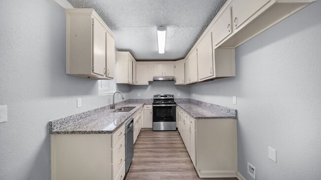 Building Photo - Rural, wooded living in this 4 bedroom, 2 full bath home on just under a quarter of an acre. NEW ...