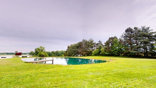 Building Photo - County living with pond & out buildings