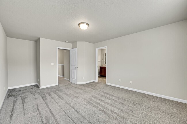 Building Photo - $2,040.95 -  3 bed, 2.5 bath Townhome in CO Springs with Central AC!