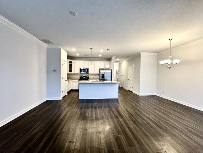 Building Photo - A 1st-Time Rental Available NOW! 3/3.5 Newer End-Unit Townhome w/Garage - Landscaping Included!